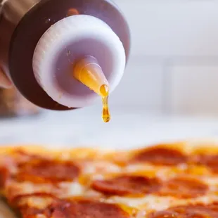 a slice of pepperoni pizza