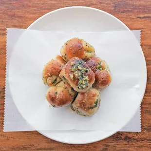 a plate of mini pizzas
