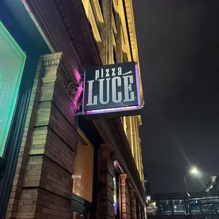 a neon sign for a restaurant