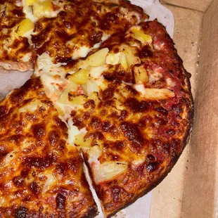 a sliced pizza in a box