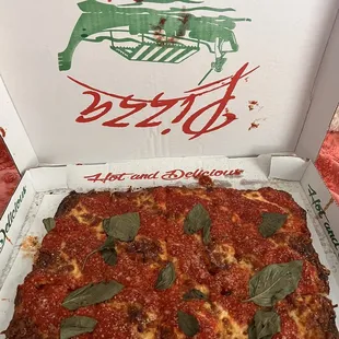 a pizza in a pizza box