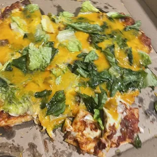 The "beef" taco pizza is puzzling; it lacks even a hint taco seasoning , and there's a scarcity of beef.