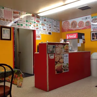 a red counter with menus on it