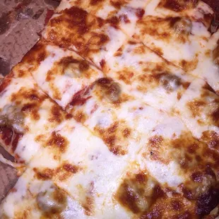 Sausage and Pepperoni: 16 inches of Big, Beautiful, Cheesy Love.  A little extra well done for that nice char.