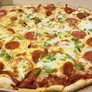 pepperoni and cheese pizza in a box