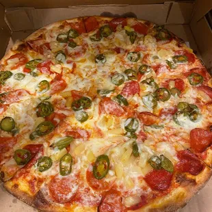 Jalapeño, pineapple, pepperoni cheese pizza