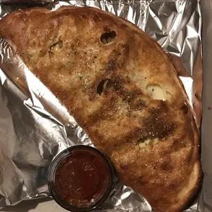 a piece of bread with sauce