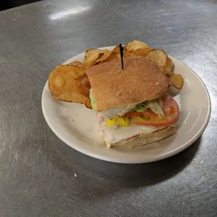 Daily sandwich specials with homemade bread, and homemade chips on the side.