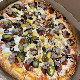 My half always has to half pineapple and jalapeños!