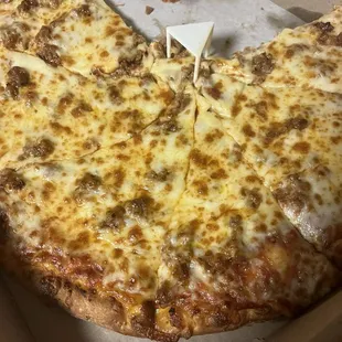 Medium pizza- sausage and xtra cheese