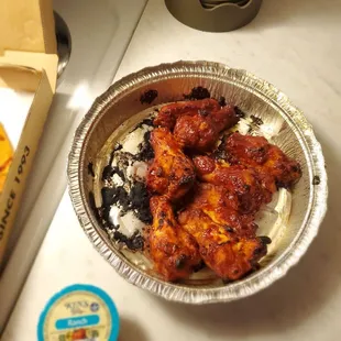 Bbq wings. Baked. A little too much char but still decent.