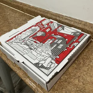 a pizza box on a counter