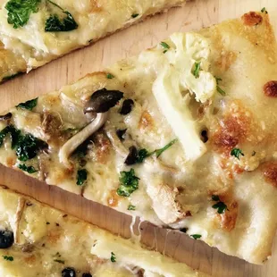 truffle oil, wild mushrooms, cauliflower, and gruyere