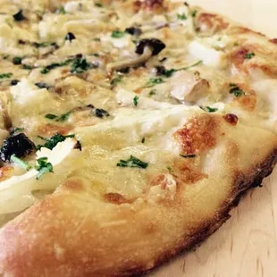 truffle oil, wild mushrooms, cauliflower, and gruyere