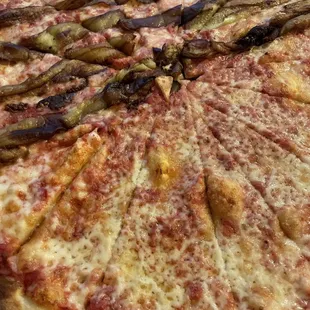 a pizza with an assortment of toppings