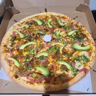 a whole pizza in a box