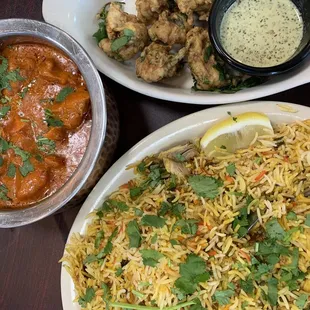 Chicken Biryani and Chicken Makhani (Butter Chicken). Can&apos;t remember the appetizer.