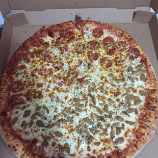 Half sausage half pepperoni with extra cheese.     After I doctored it up with a bunch of basil