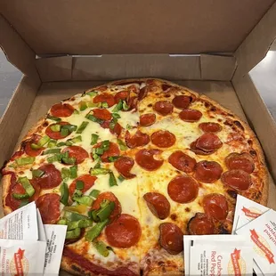 Whole pepperoni pie with half jalapeños and green peppers. Delish!