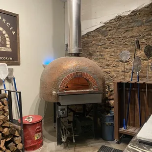 Copper pennies ador the wood fired pizza oven