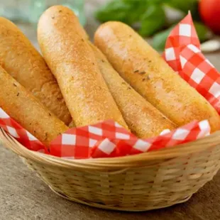 a basket full of breadsticks