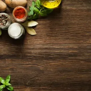 a variety of vegetables on a wooden table