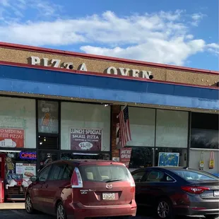 The store front of Pizza Oven in Riverdale, MD. It's a hike for me, but worth it.