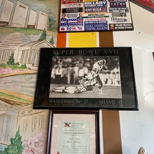 a picture of a baseball player and a plaque