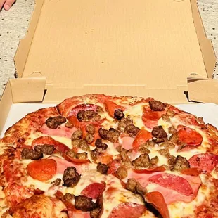 a pizza in a pizza box