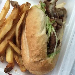 Half a steak sandwich all the way with fries. Bread was freshly baked. Everything was very tasty but the mushrooms tasted canned