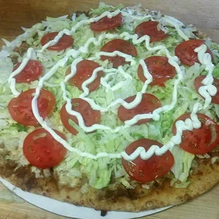 Try our Mexican Pizza a crowd pleaser for sure