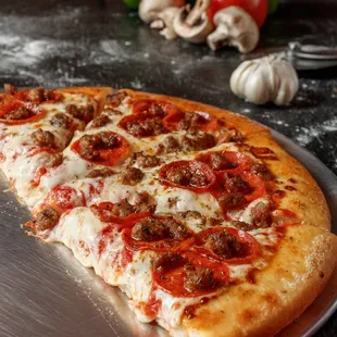 Italian Stallion (this is our 3 Meat pizza) pepperoni, Italian sausage, beef with Italian seasoning