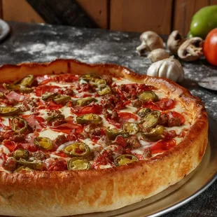 This is a picture of our Deep Dish Meat lovers with Jalapeños