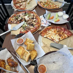 Pizza, wings garlic bread