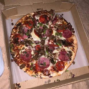 a pizza in a pizza box