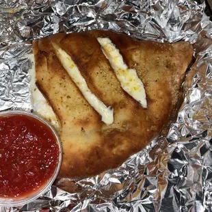 Cheese calzone (split)