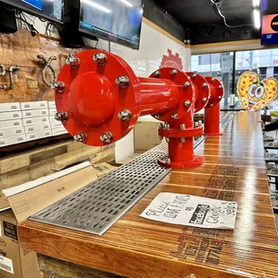 a red fire hydrant in a store