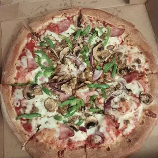 Large thick crust supreme with no pepperoni.