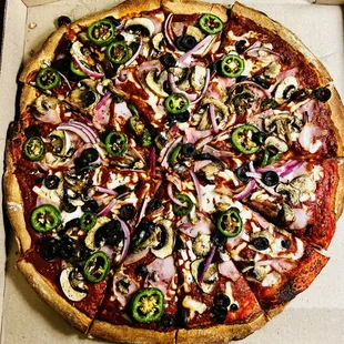 Create Your Own: ham, black olives, mushrooms, onions and jalapeños