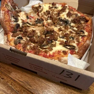 Small extra cheese, mushroom, and sausage.