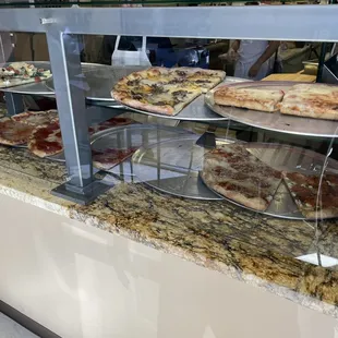 Pizza by the slice lunch selection. Great prices!