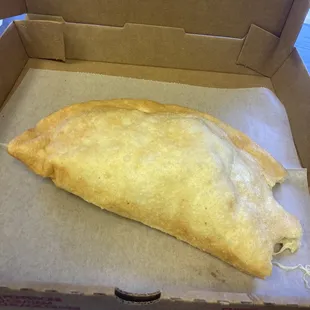 Sorry...took a bite from this fried calzones prior to taking the picture...very excited!