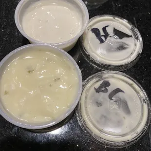 2 Blue cheese dressing containers; 2 different colors. Rotating inventory would help