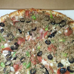 Large Supreme.  Great Deal and AMAZING Taste. We drive 15 miles to order from here, passing several chain pizza shops. A MUST TRY.
