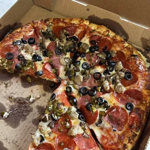 Medium Pizza - Pepperoni, sausage,  Canadian bacon, mushrooms, olives, and Jalapeños so good!!