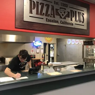 a man working behind the counter