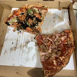 "Giant" Pizza after only 6 slices removed.  Half was all meat, missing the linguica and bacon, the other half vegetarian.