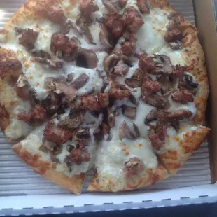 Mushroom and sausage with white sauce.