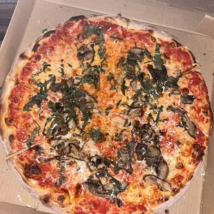 Hand tossed cheese pizza with shiitakes and basil!