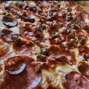 a pepperoni and sausage pizza